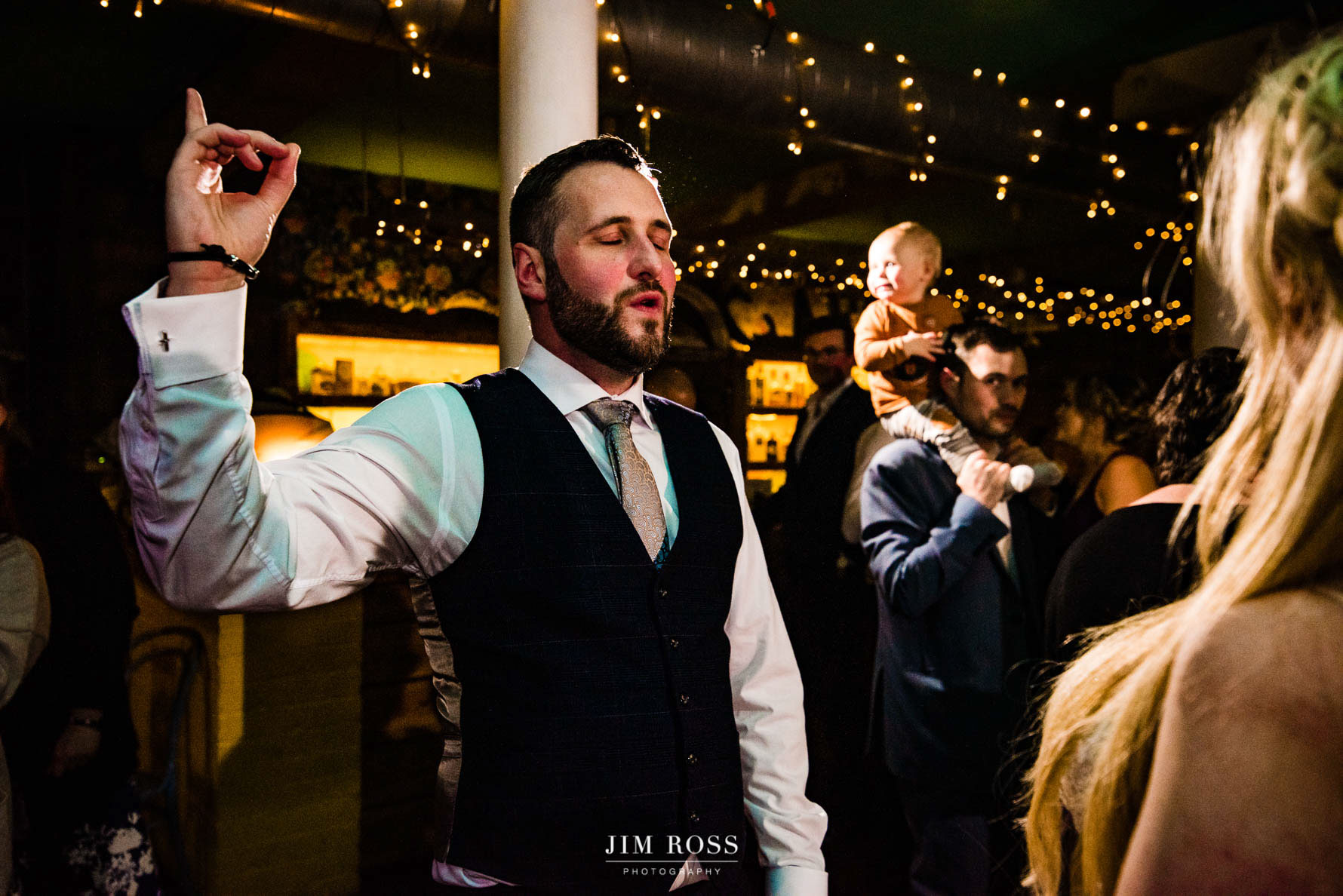 groom in the moment during first dance