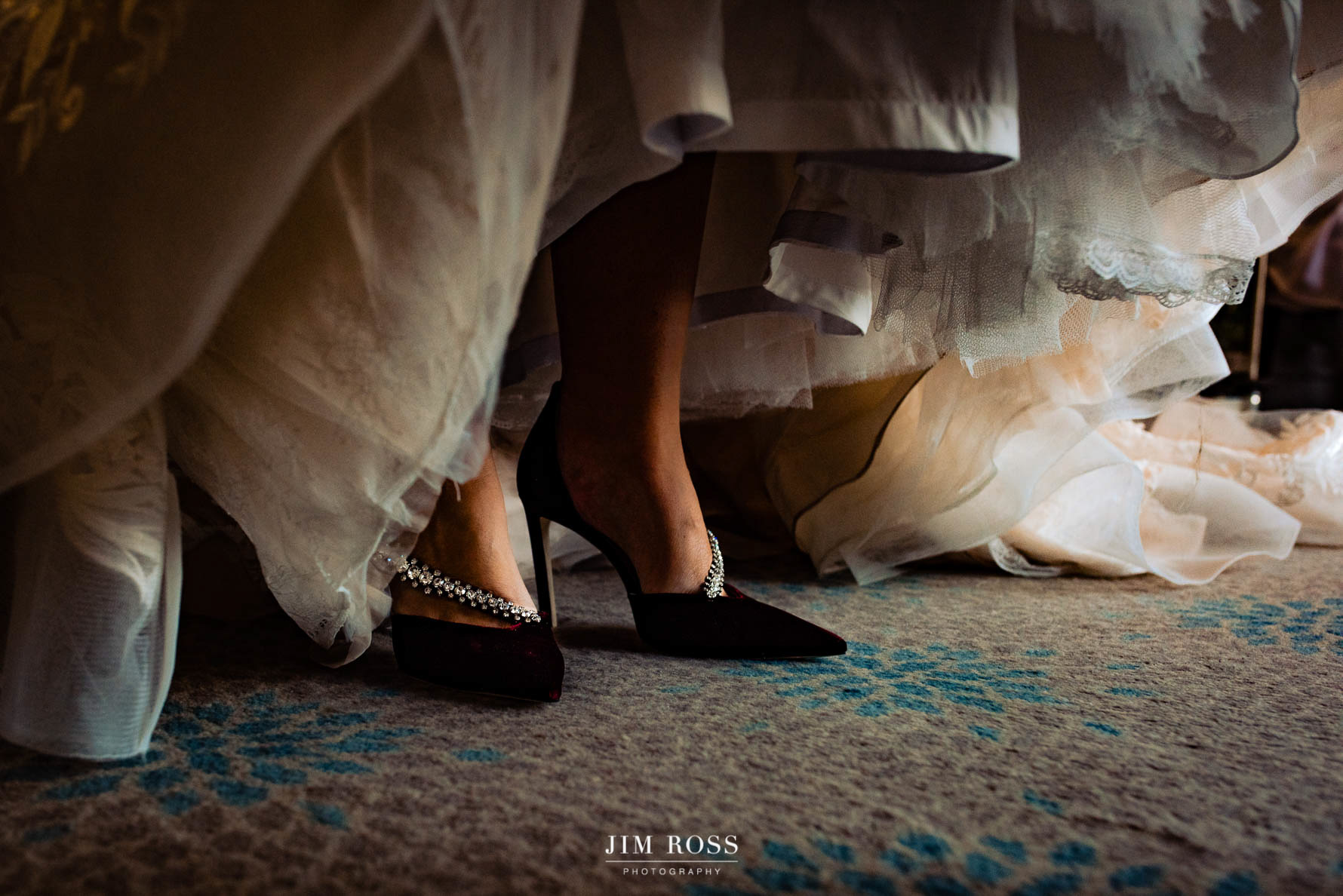 Jimmy Choo shoes under bride's dress