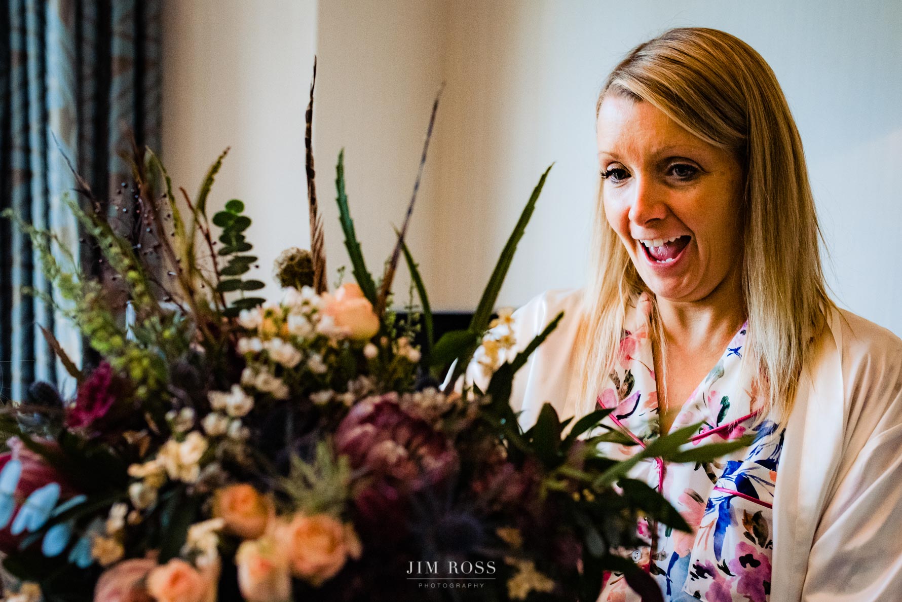 bride thrilled with delivery of bouquet