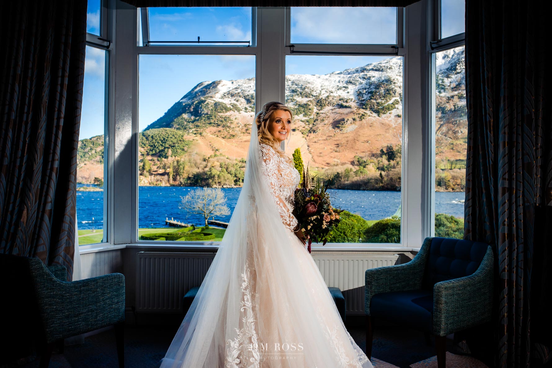 bride ready in room with wintry scene behind