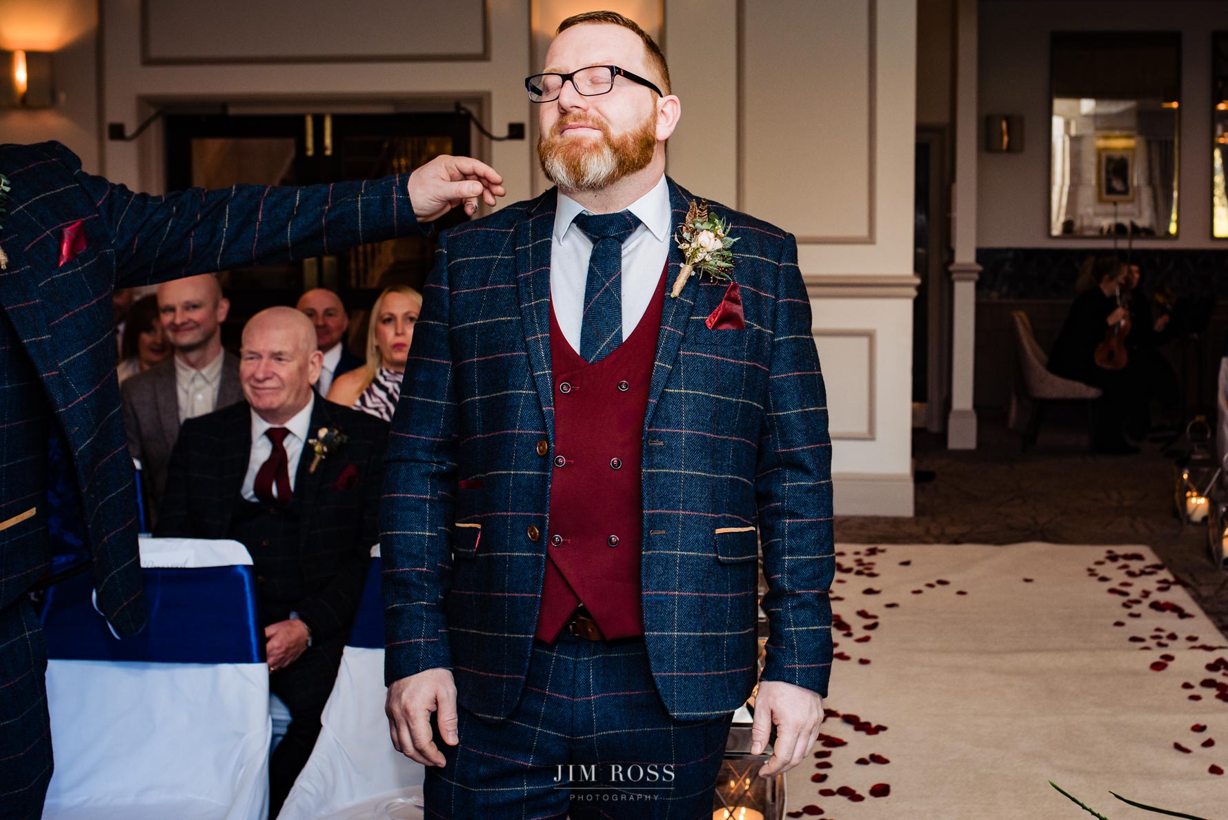 removing fluff from nervous groom