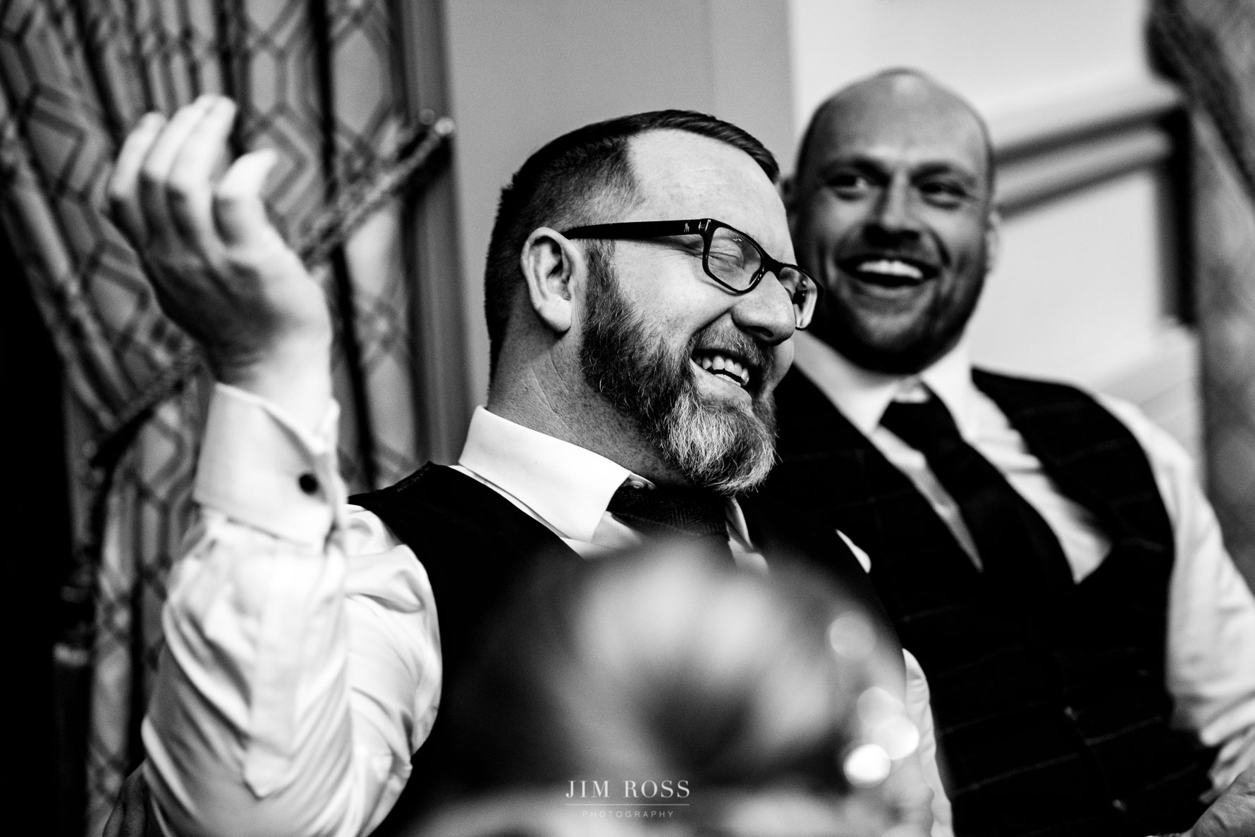laughing it up at the groom