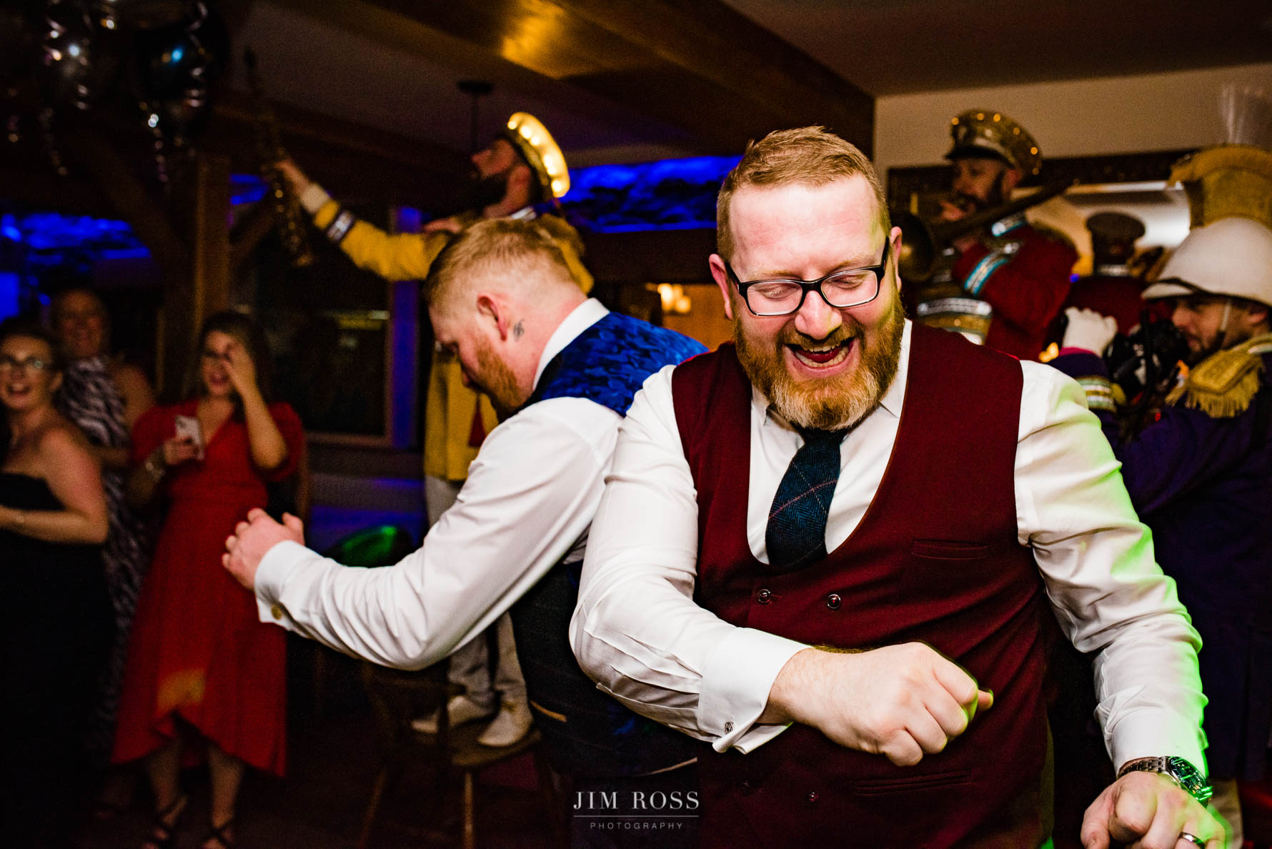 groom and brother dancing duo