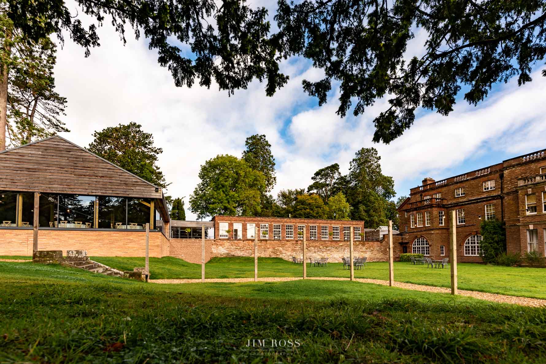 establishing shot of bredenbury court wedding barn