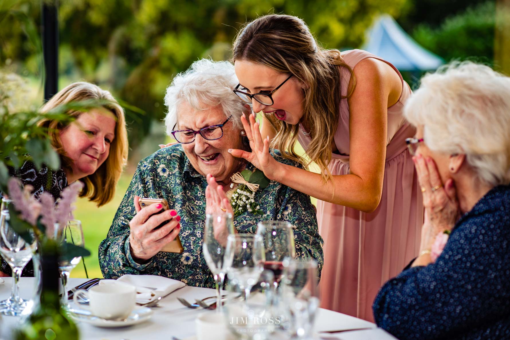 older ladies enjoying video call with loved ones