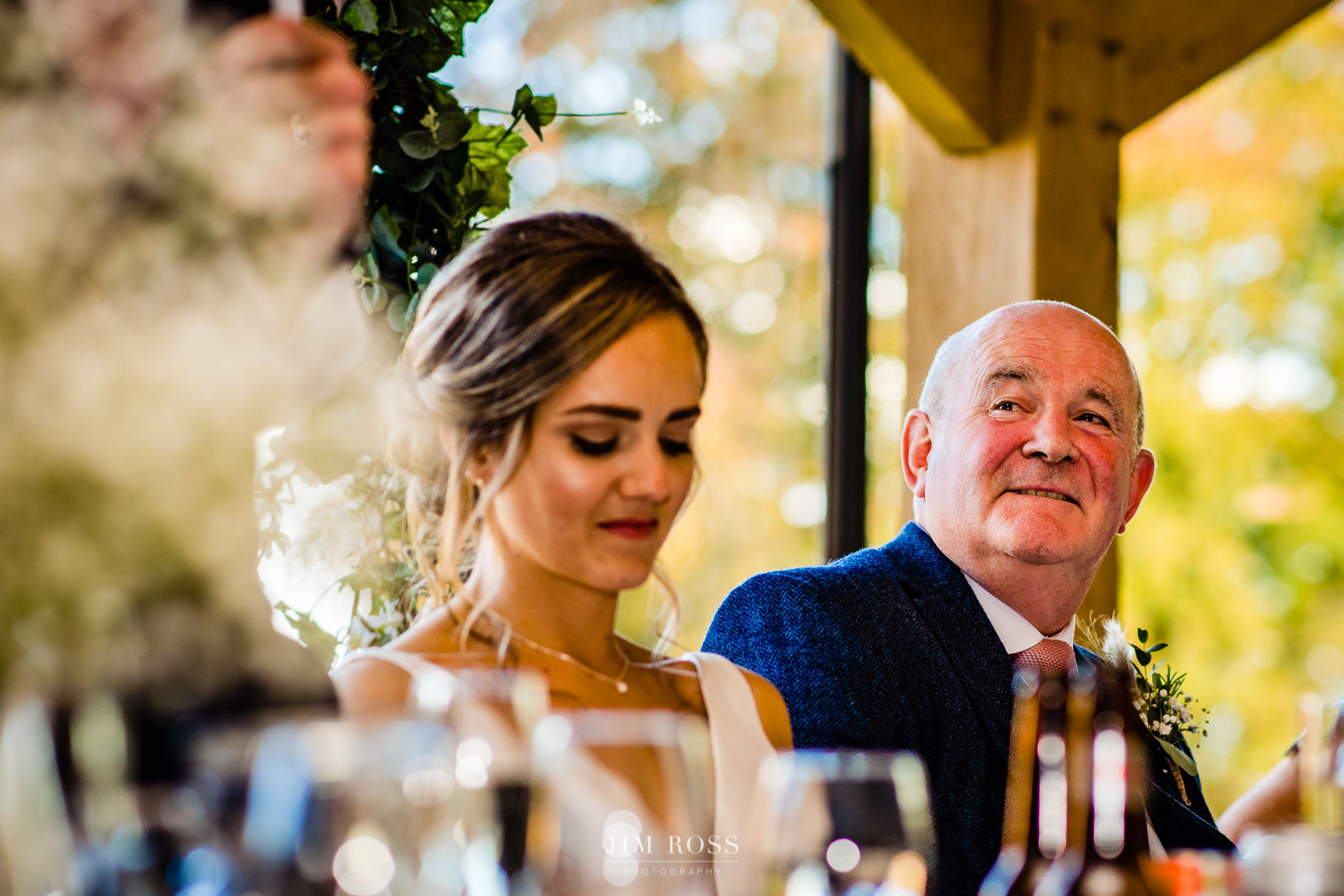 father of bride sits through groom speech