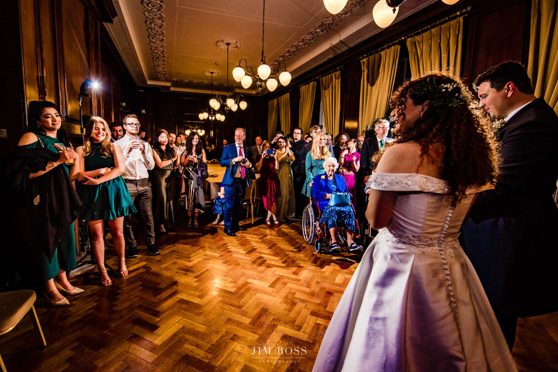 first dance reaction from guests in grand hall