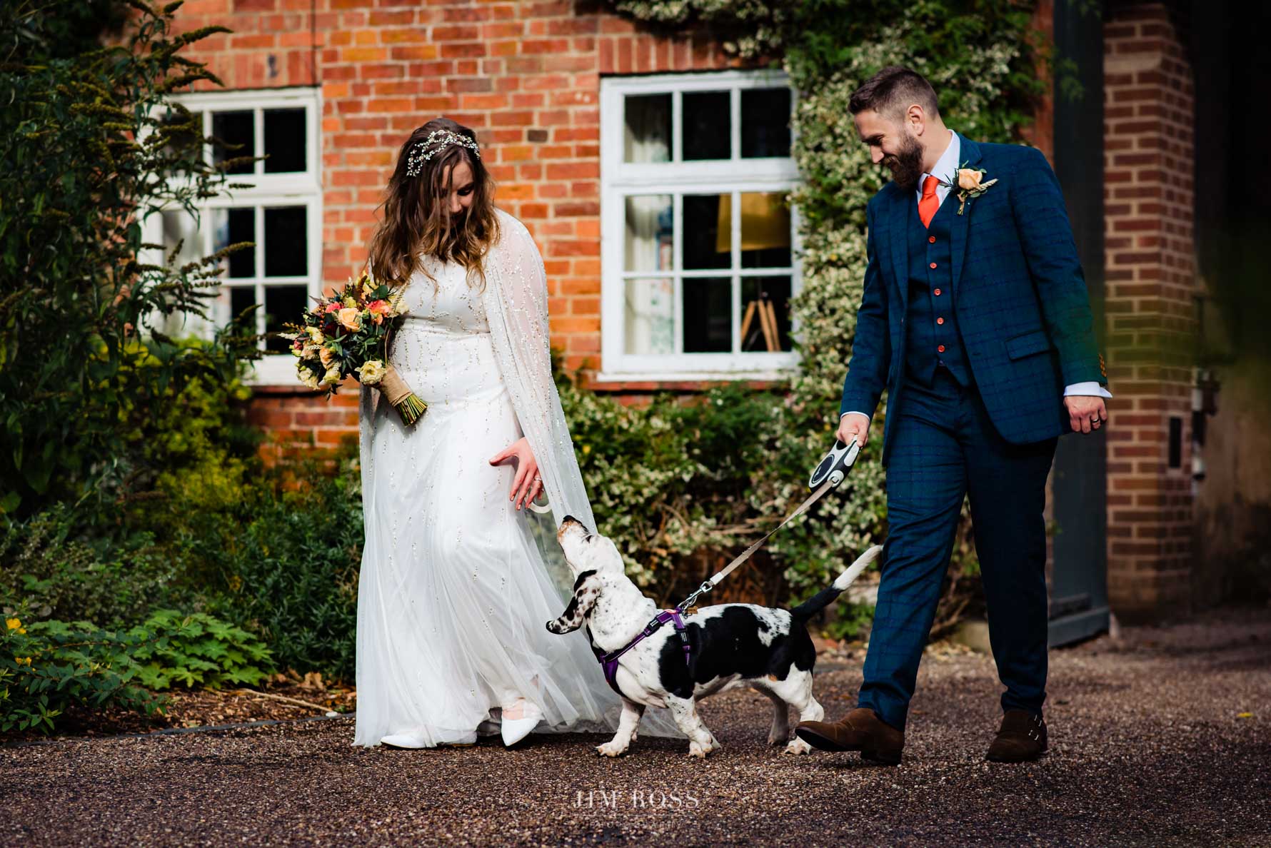 couple happy to have dog at wedding