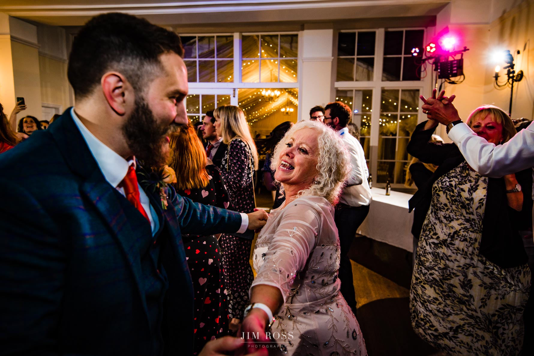 groom dancing with mum