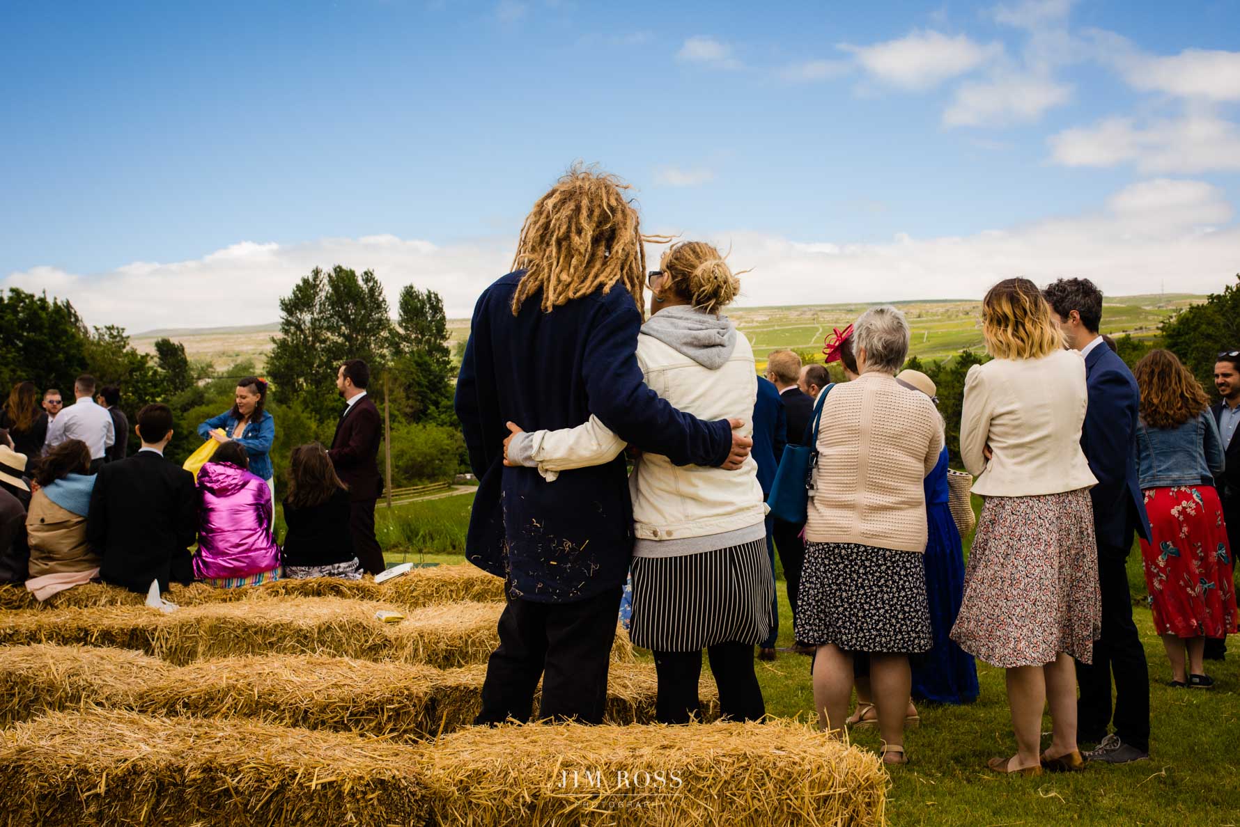 reomantic moment for dreadlocked couple looking over Yorkshire Dales