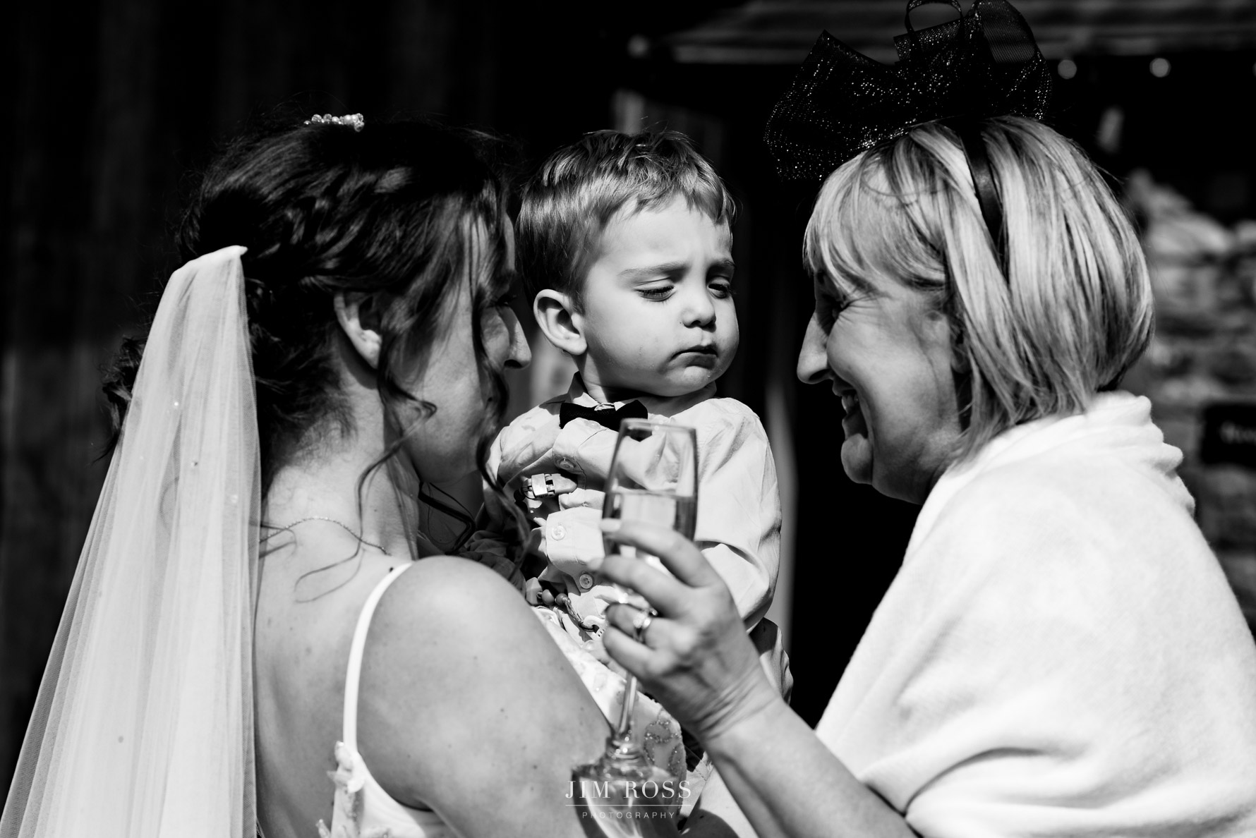 bride's son giving mum's aunty a quizzical look