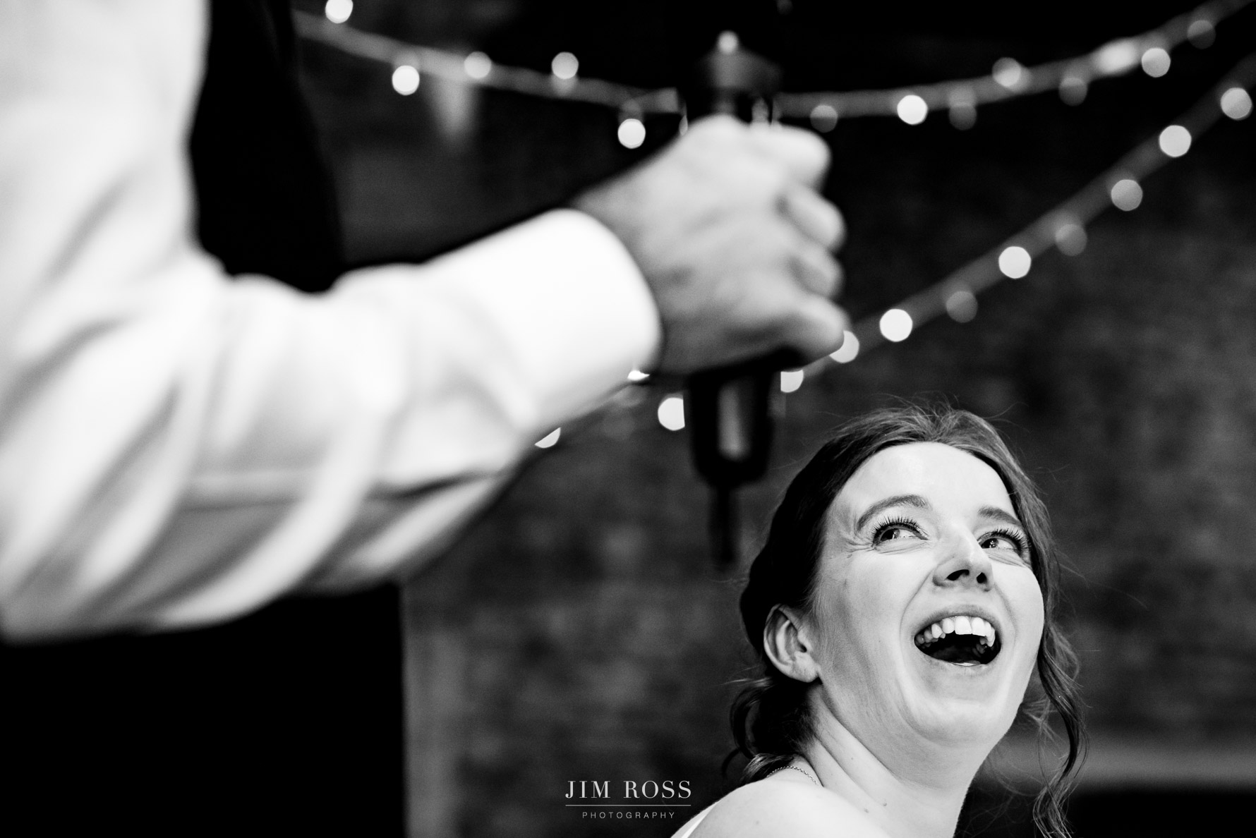 big laugh from bride to groom