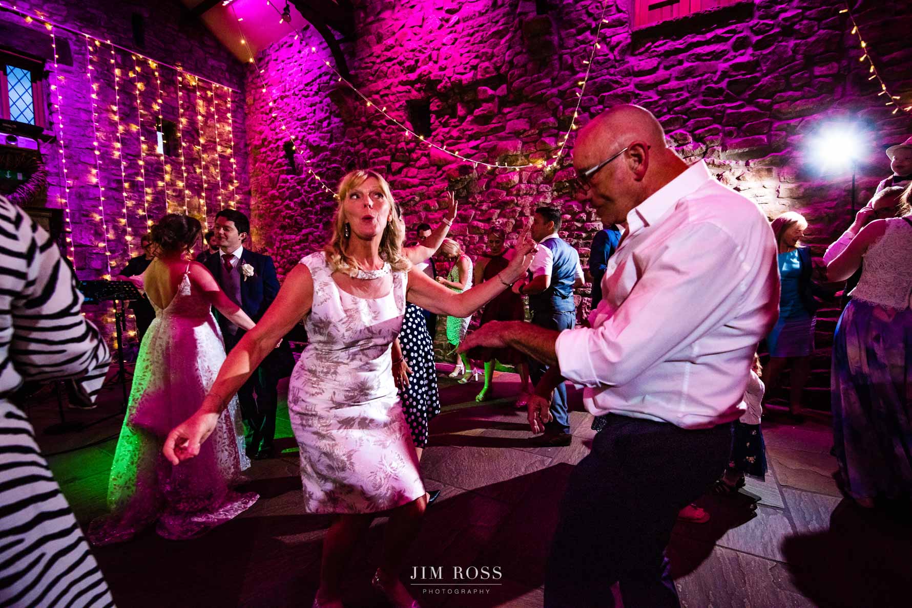 bride's parents dancing wildly