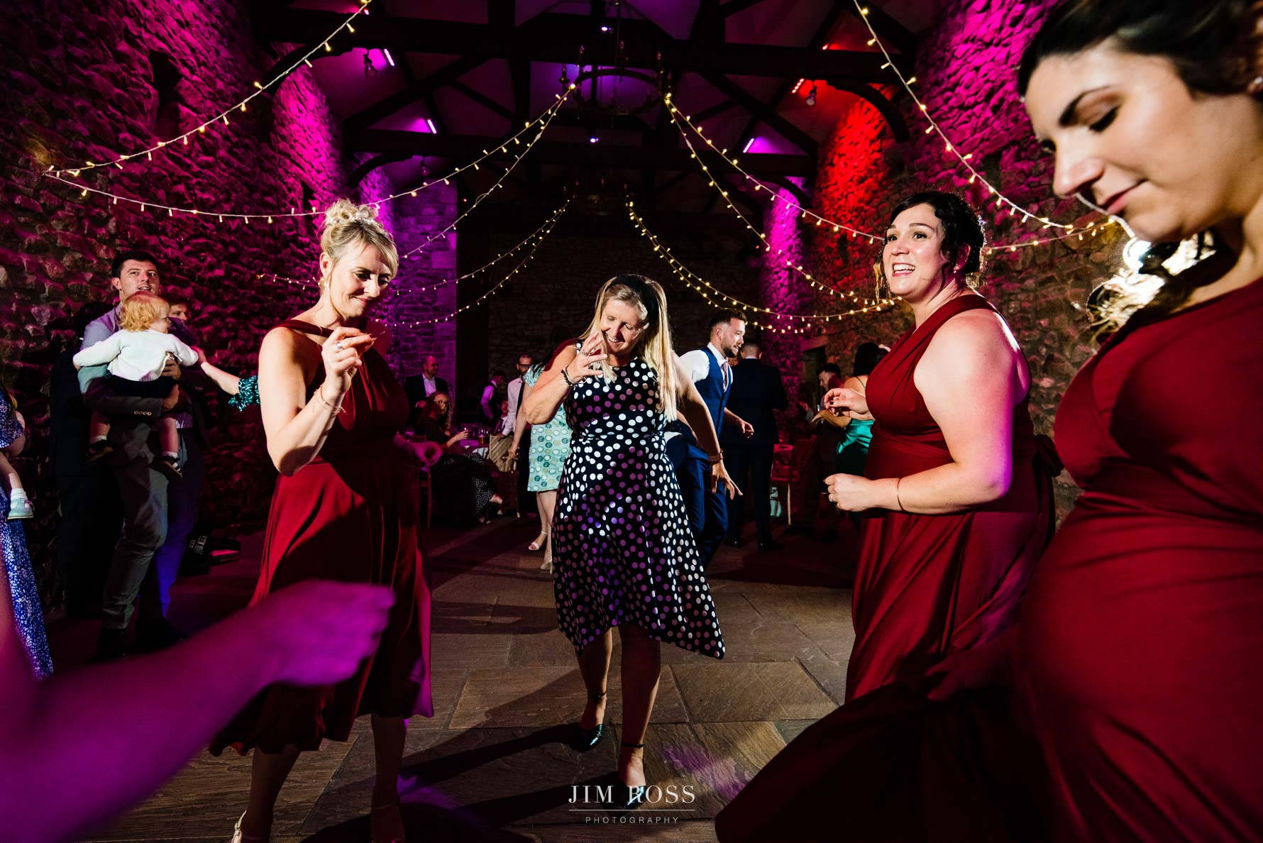 bridesmaids dancing in circle