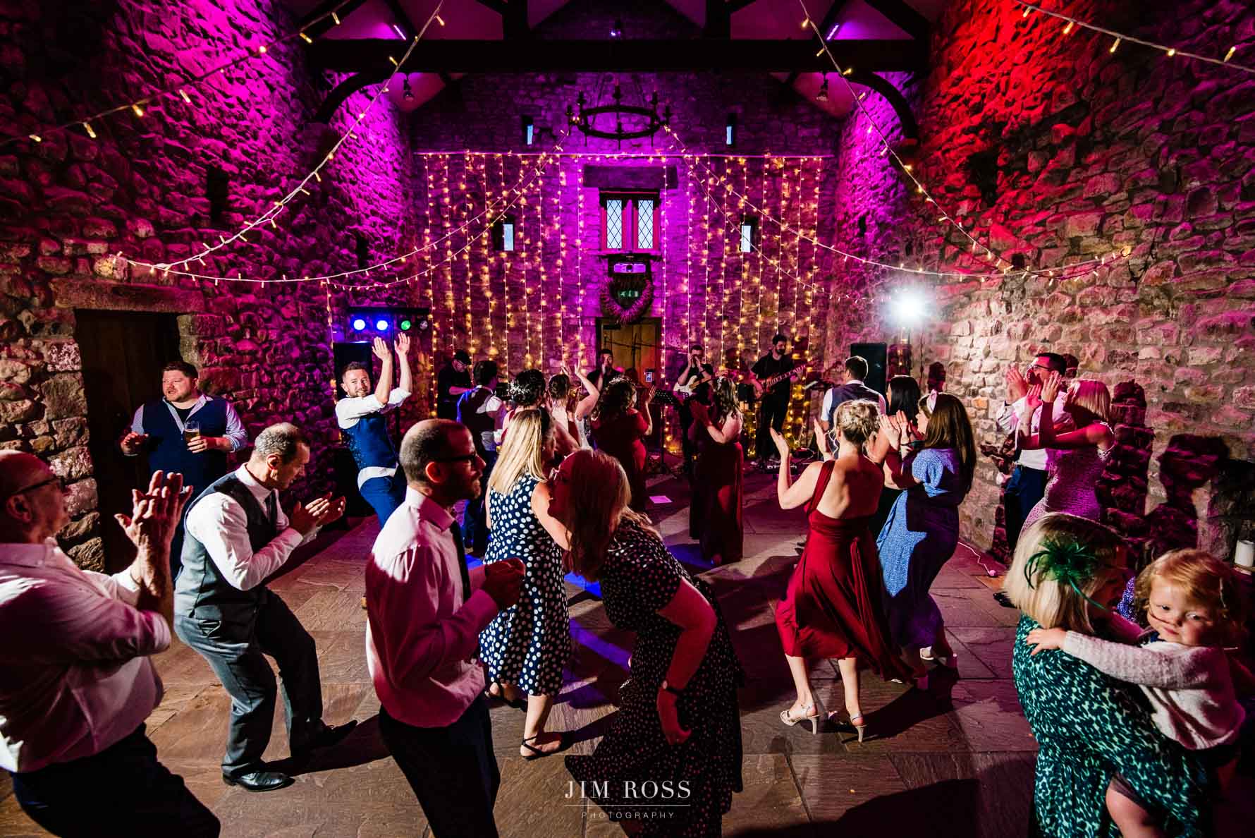 wide shot of wedding barn dance floor