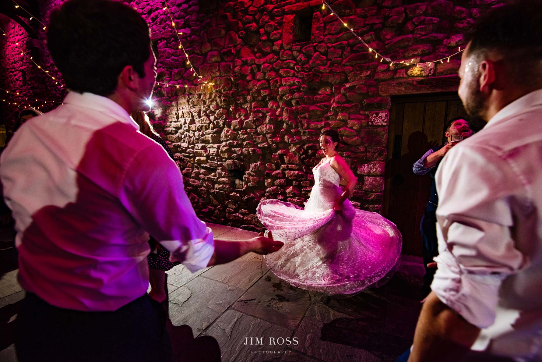 bride twirls dress on dancefloor
