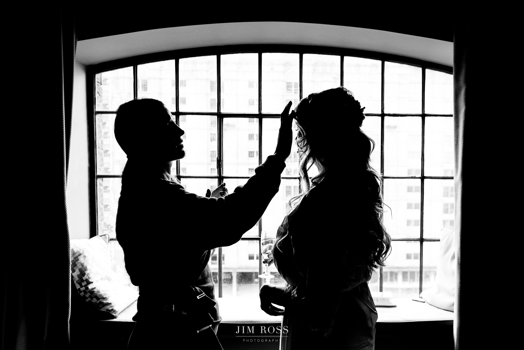 silhouette of bridal hair adjustments