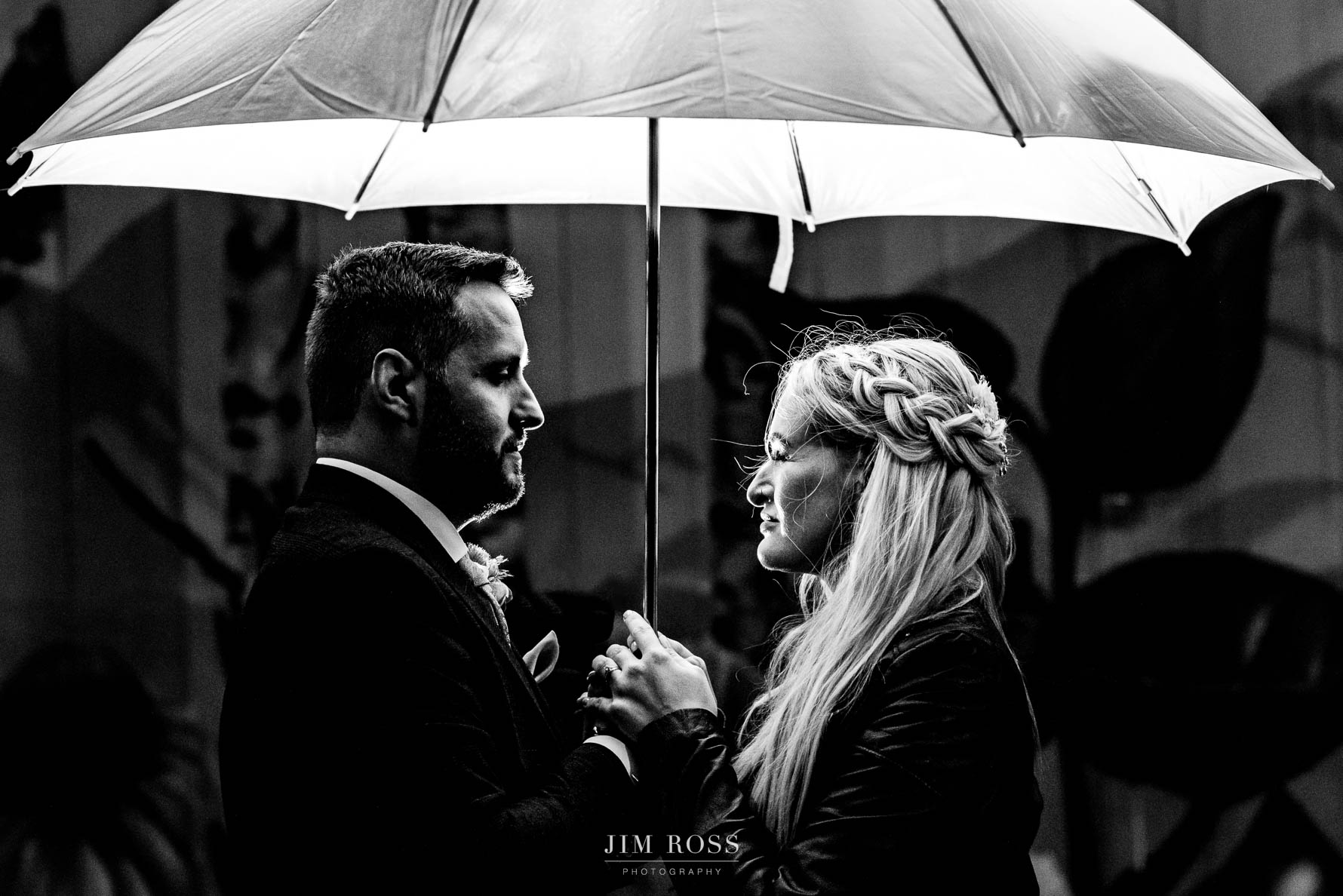 Night portrait under umbrella - black and white