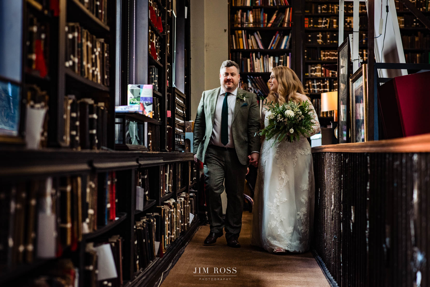 Newlyweds leaving Portico Library together